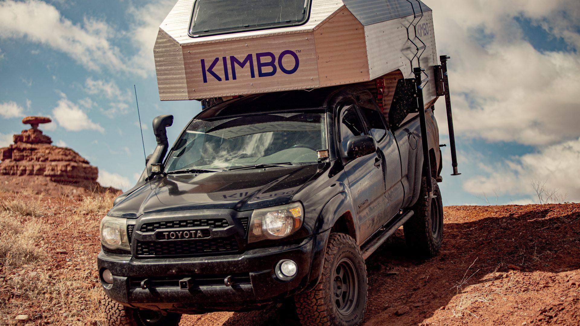Kimbo 6 hand-riveted aluminium hard-side truck camper on a mid-size pickup